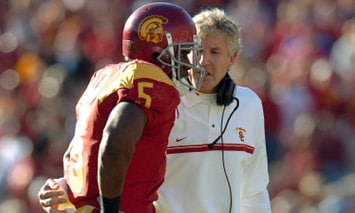 Pete Carroll and Reggie Bush are no longer at USC, but Bush's actions while Carroll was running the program have resulted in major sanctions on the Southern Cal program.  (Photo - IconSMI)