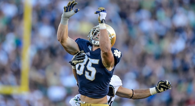 Troy Niklas attempts to haul in a pass against Purdue