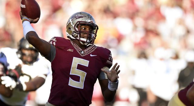 Oct 4, 2014; Tallahassee, FL, USA; Florida State Seminoles quarterback Jameis Winston (5) drops back to pass against the Wake Forest Demon Deacons during the fourth quarter at Doak Campbell Stadium. Florida State Seminoles defeated the Wake Forest Demon Deacons 43-3. Mandatory Credit: John David Mercer-USA TODAY Sports
