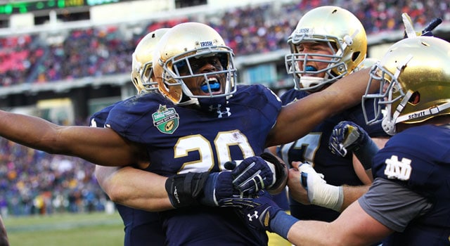 Notre Dame Fighting Irish wide receiver C.J. Prosise (20) celebrates with his teammates in the end zone during the third quarter of the Franklin American Mortgage Music City Bowl game between Notre Dame and LSU. The Irish defeat the Tigers 31-28 at LP Field in Nashville, TN. (Photo: Frank Mattia/Icon Sportswire)