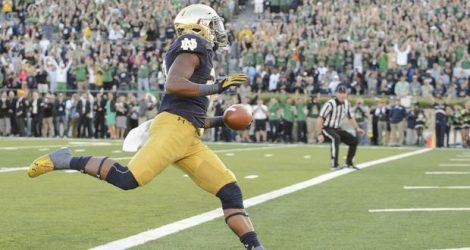 Sep 19, 2015; South Bend, IN, USA; Notre Dame Fighting Irish running back C.J. Prosise (20) runs into the end zone for a touchdown in the fourth quarter against the Georgia Tech Yellow Jackets at Notre Dame Stadium. Notre Dame won 30-22. Mandatory Credit: Matt Cashore-USA TODAY Sports
