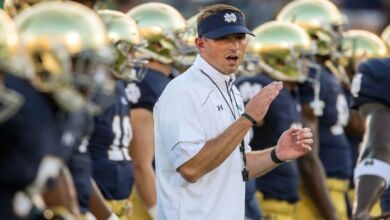 Sep 5, 2015; South Bend, IN, USA; Notre Dame Fighting Irish offensive coordinator Mike Sanford, Jr. watches warmups before the game against the Texas Longhorns at Notre Dame Stadium. Notre Dame won 38-3. Mandatory Credit: Matt Cashore-USA TODAY Sports