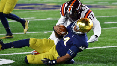 Notre Dame QB Deshone Kizer taking one of two uncalled helmet to helmet hits in 2016 contest with Virginia Tech