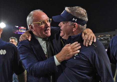 Notre Dame HC Brian Kelly and AD Jack Swarbrick celebrate their 2nd perfect regular season at Notre Dame