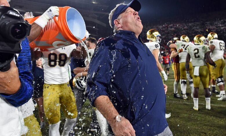 Notre Dame Heach Coach Brian Kelly gets showered in Gatorade after another perfect regular season.