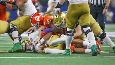 Notre Dame QB Ian Book sacked one of six times by Clemson.