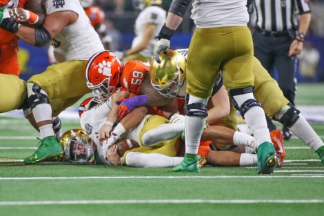 Notre Dame QB Ian Book sacked one of six times by Clemson.