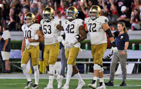 Notre Dame Fighting Irish team captains Chris Finke (10), Khalid Kareem (53), Julian Okwara (42) and Robert Hainsey (72)