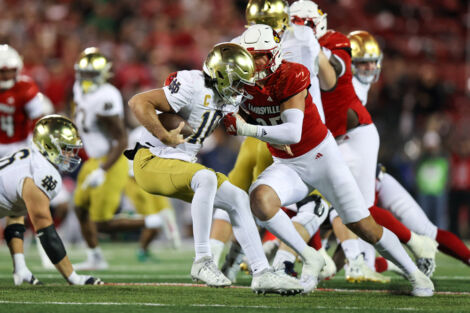 Notre Dame QB Sam Hartman gets sacked vs. Louisville (Photo by Frank Jansky/Icon Sportswire)