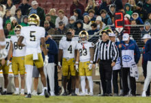 Jeremiyah Love #4 and Nolan James Jr. #23 of the Notre Dame Fighting Irish