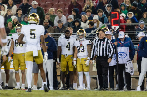 Jeremiyah Love #4 and Nolan James Jr. #23 of the Notre Dame Fighting Irish