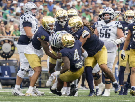 SOUTH BEND, IN - SEPTEMBER 12: The Notre Dame Fighting Irish defense sacks Rice Owls quarterback Jacurri Brown