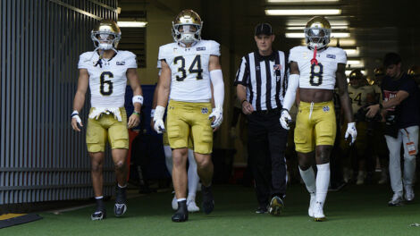 CHAPEL HILL, NC - OCTOBER 03: Jordan Faison (6), Drayk Bowen (34) and Adon Shuler (8) of the Notre Dame Fighting Irish walk to the field before the college football game against the North Carolina Tar Heels on October 03, 2026 at Kenan Memorial Stadium in Chapel Hill, North Carolina. (Photo by Joe Robbins/Icon Sportswire)